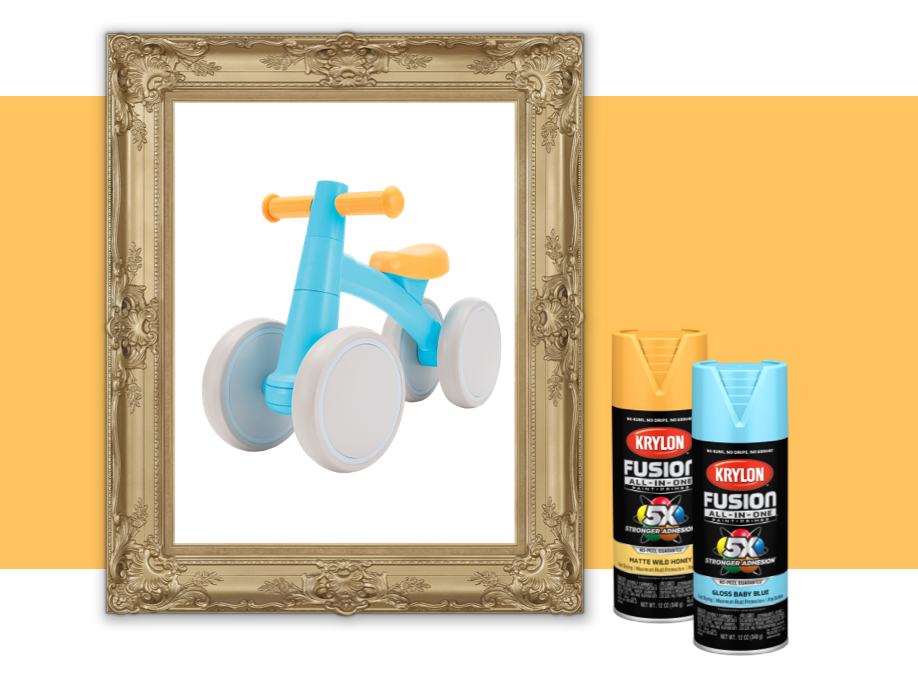 Toy bike with Krylon spray cans.