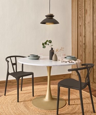 Bed table and nightstand with a lamp plus a swatch of Hammered Black