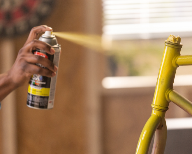 spray painting a bike frame