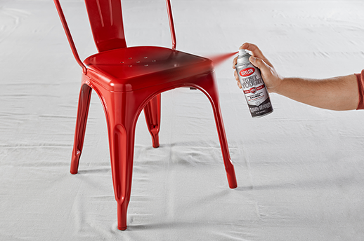 spray painting a metal chair