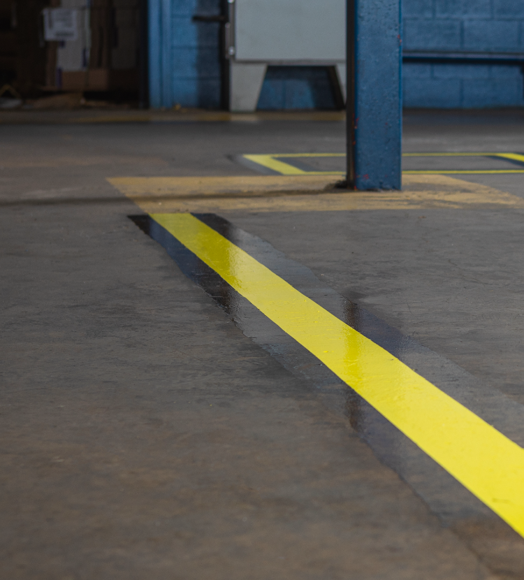 factory floor with yellow and black stripes